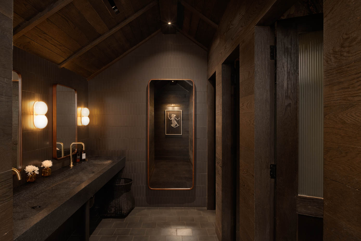 dimly lit bathroom inside restaurant