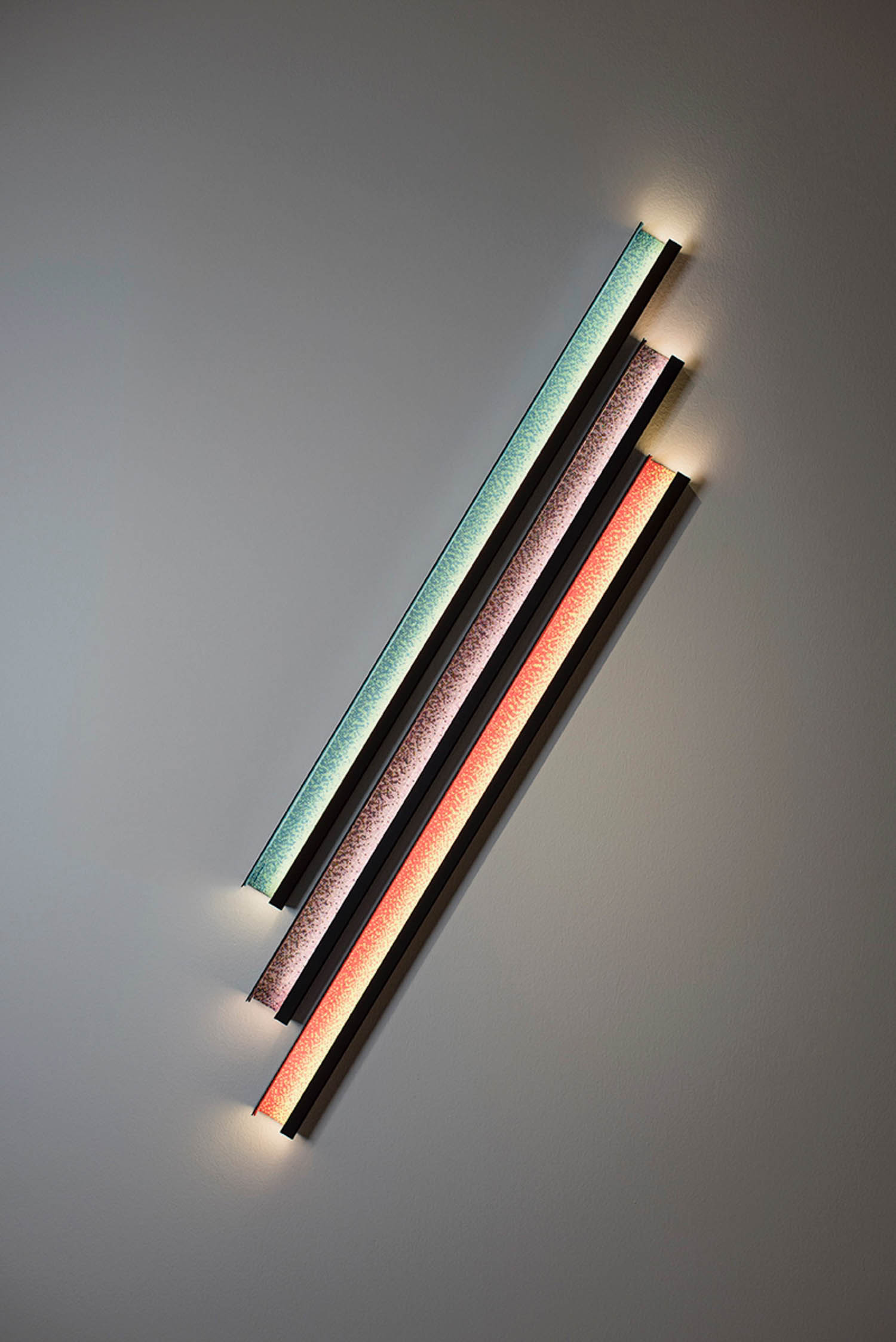 three long lights stacked on top of each other