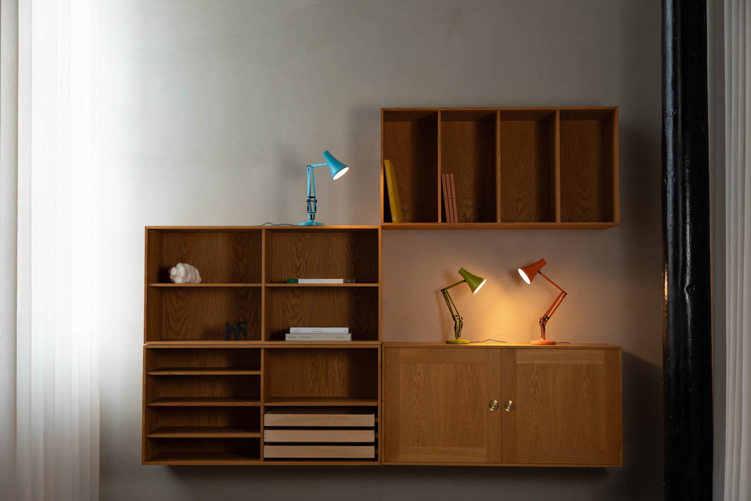 multiple lamps on a desk