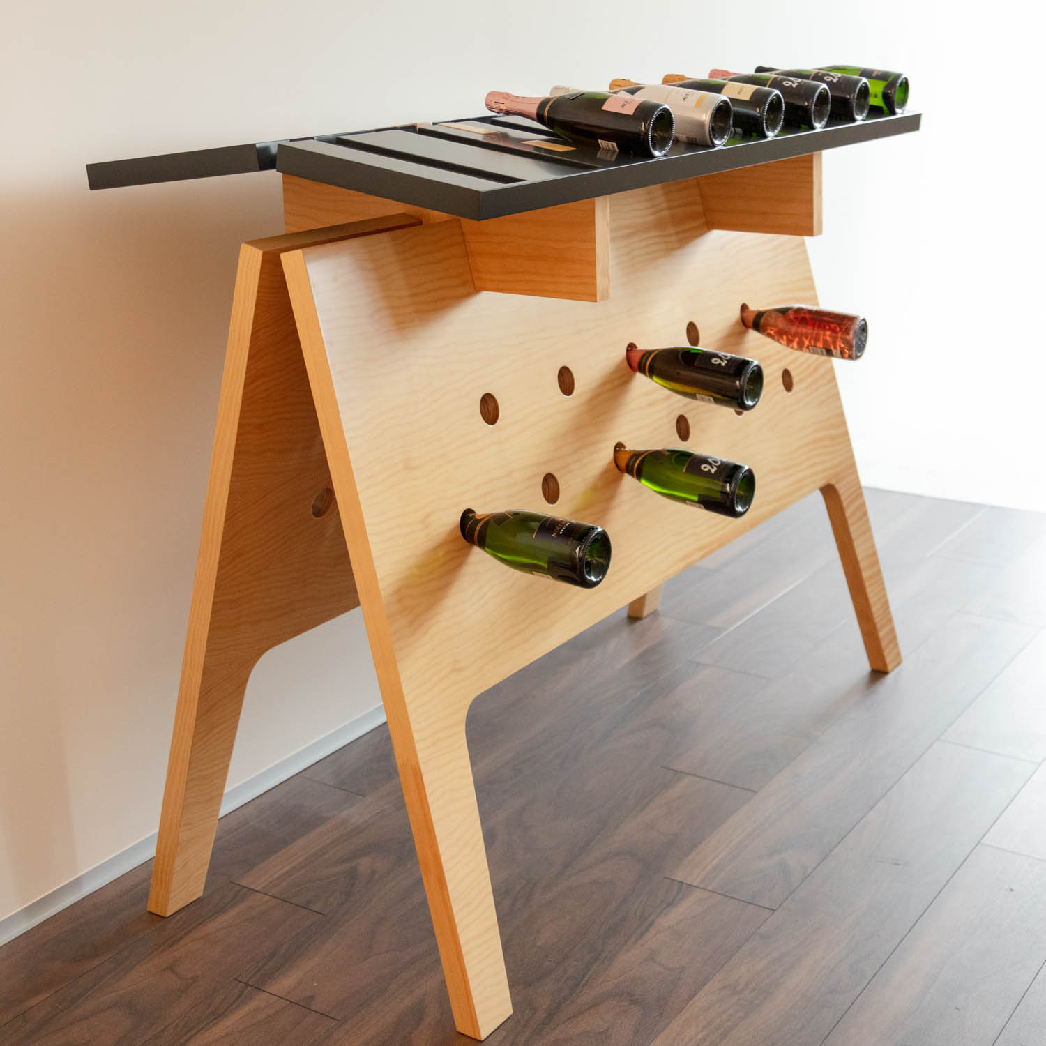wooden table holding bottles