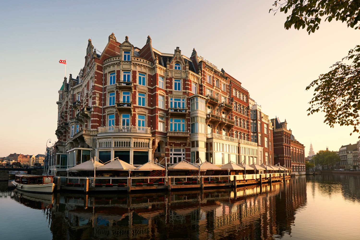 exterior of hotel over a lake