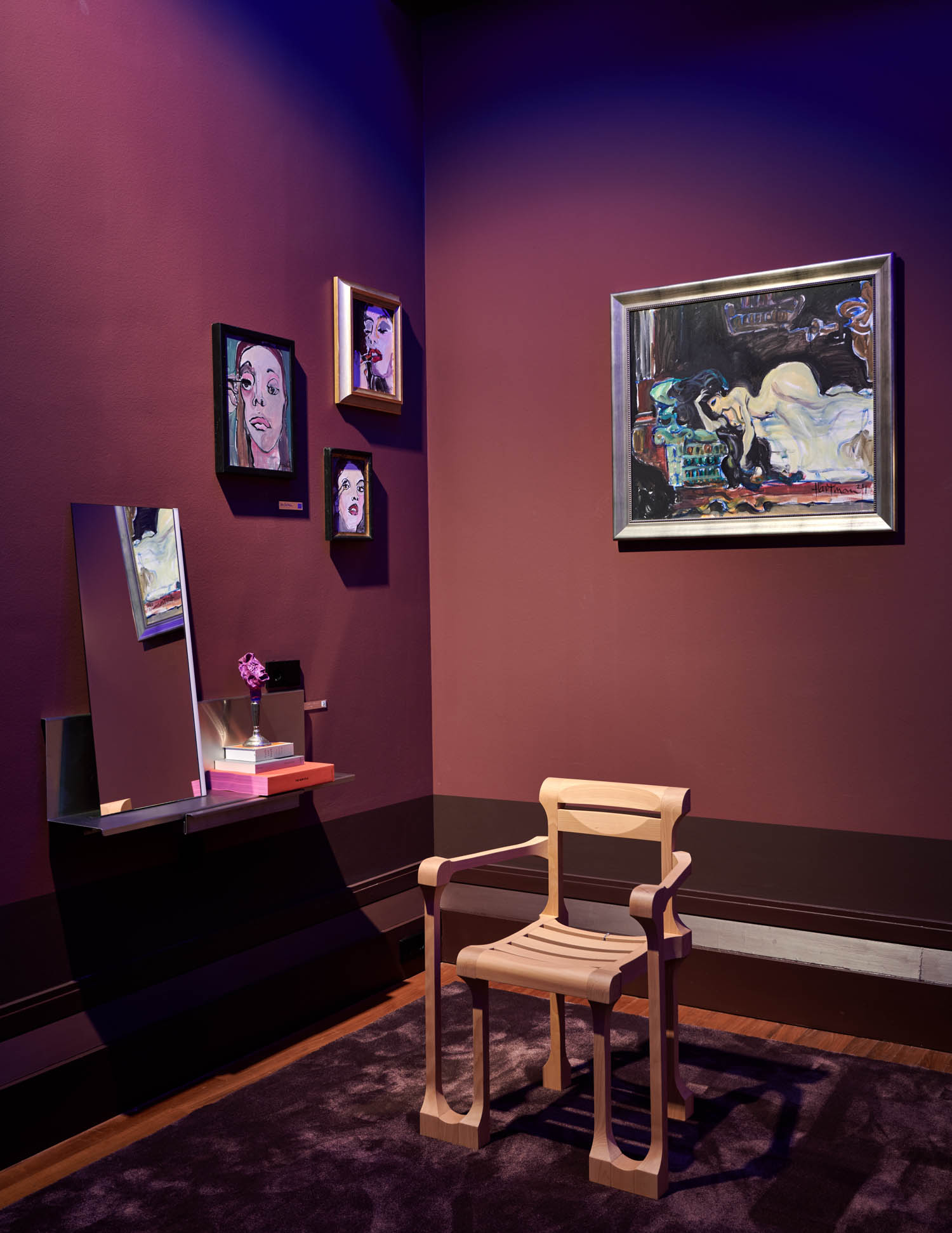 room with magenta walls and chair