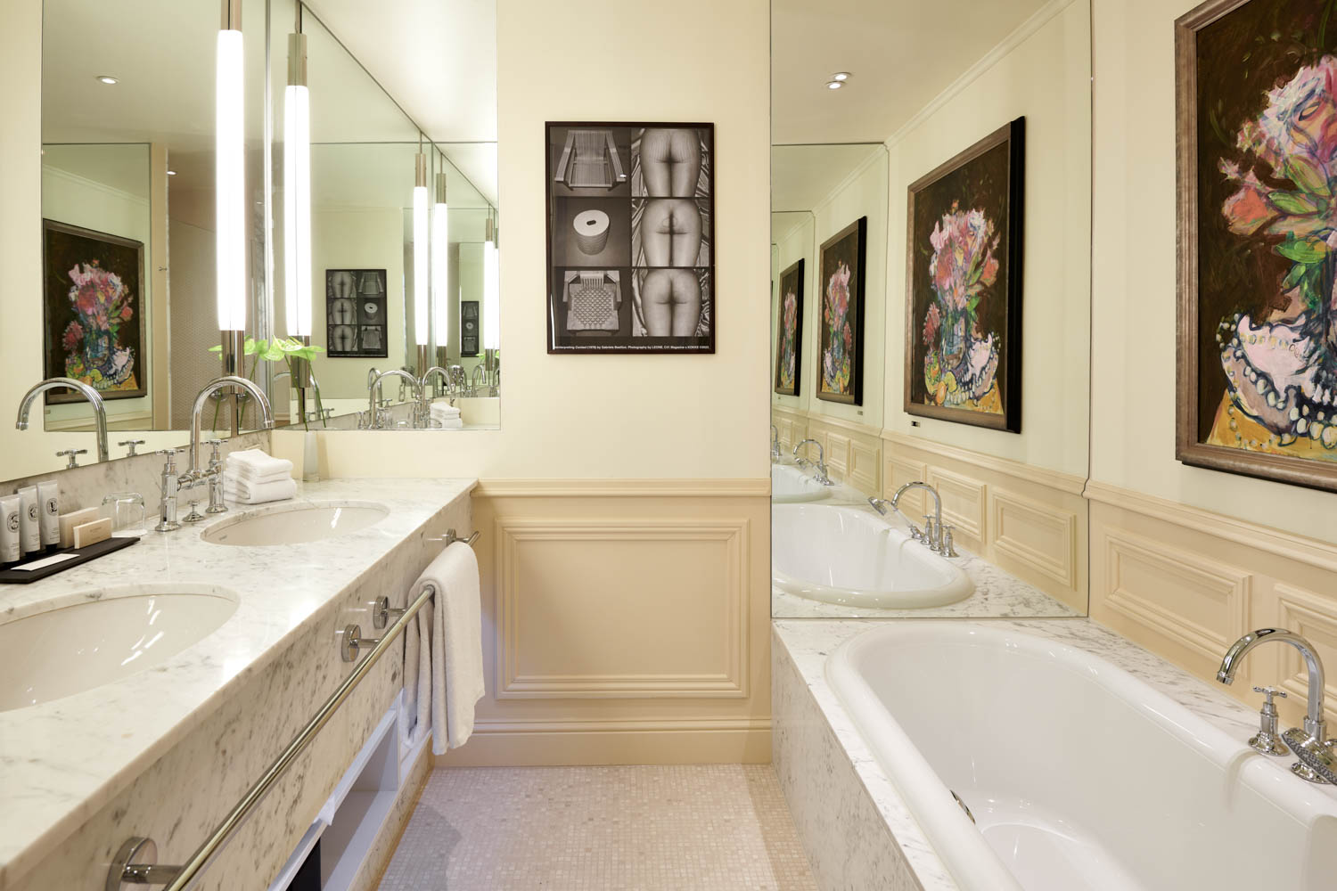 white bathroom with artwork