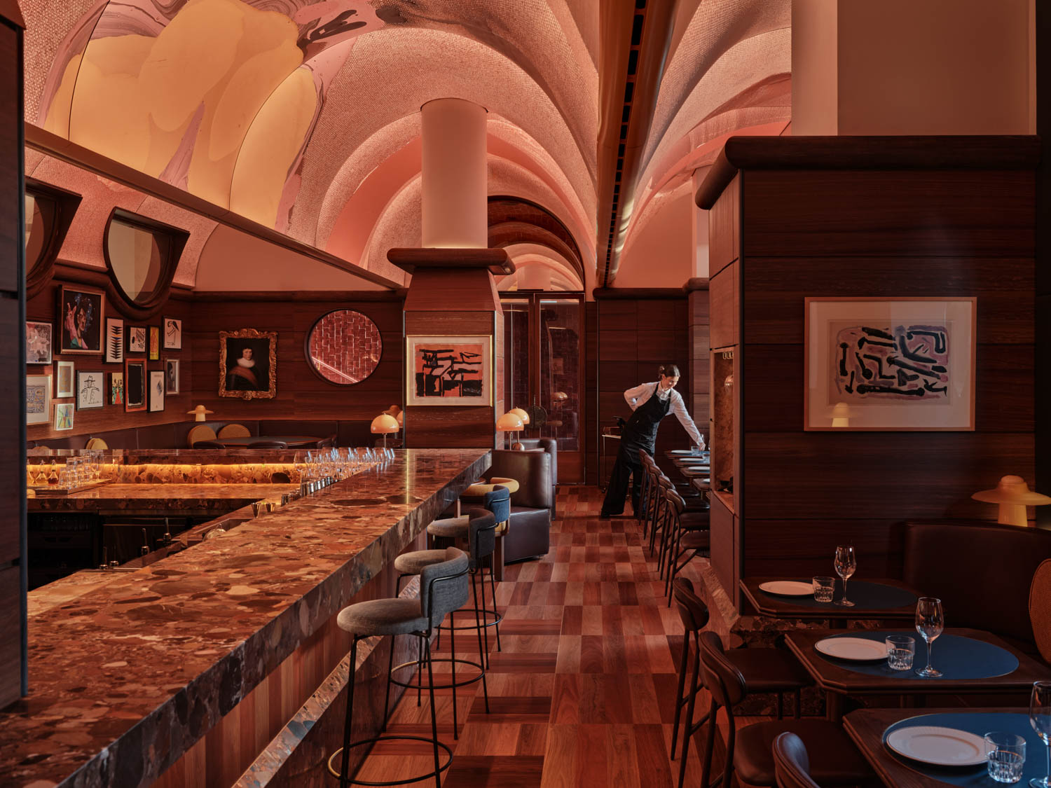 bar with coral themed murals and countertops