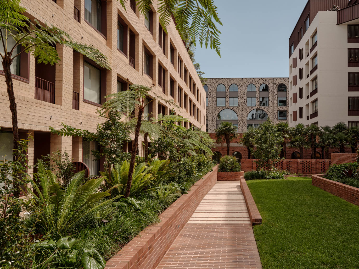 outdoor courtyard with lush greenery