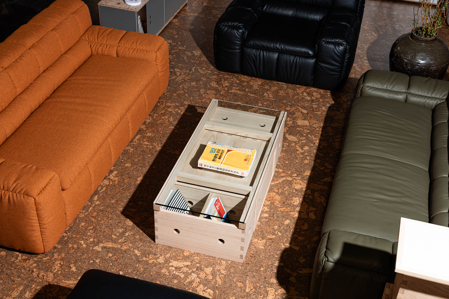 aerial view of orange and green couch around a table