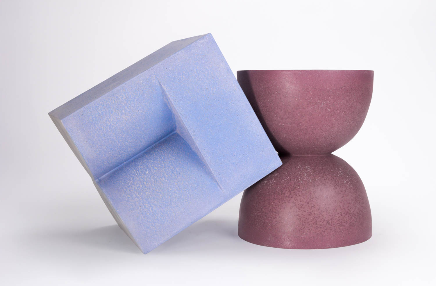 light blue cube next to a magenta side table