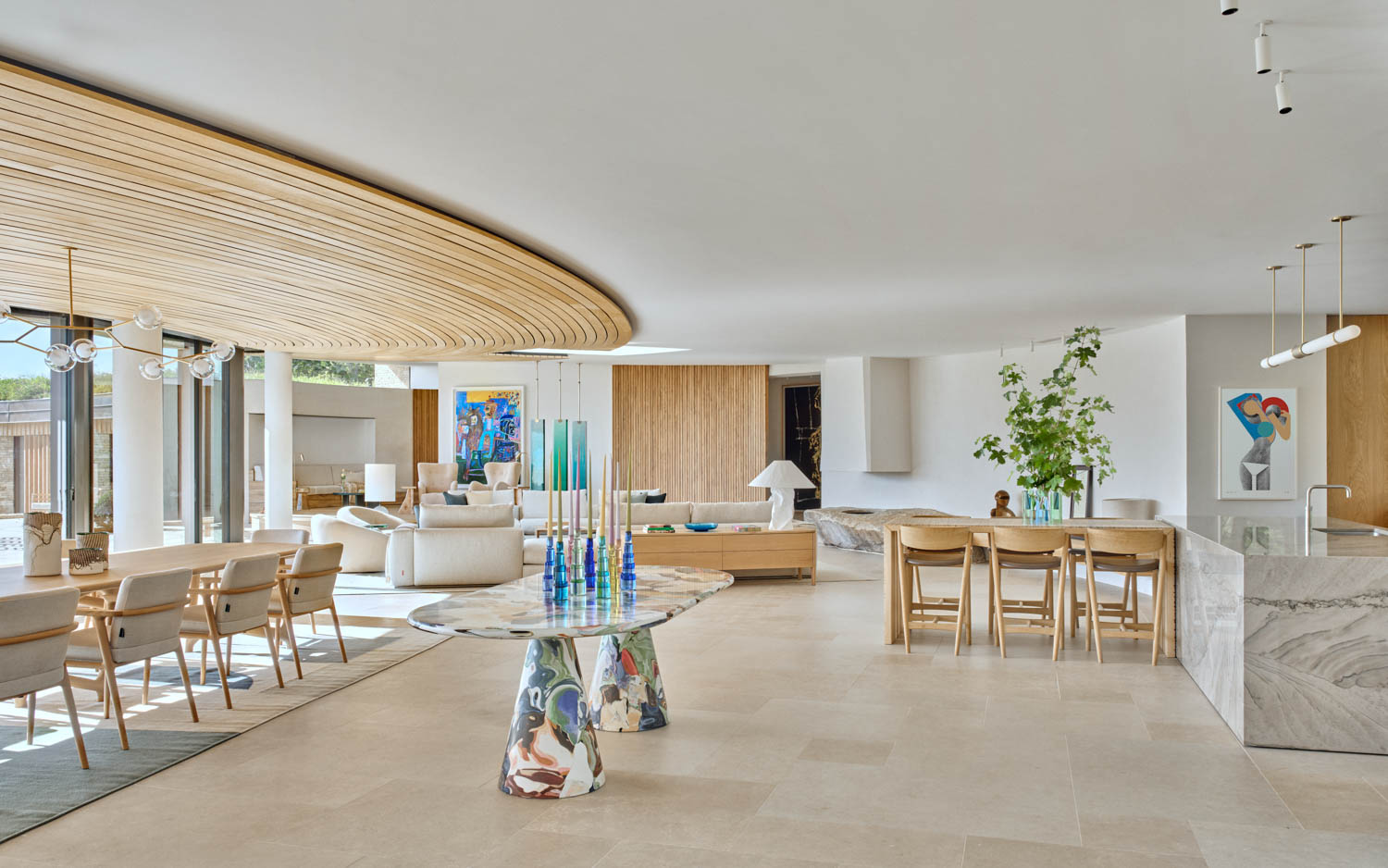 living room area with floral table and view of the outdoors