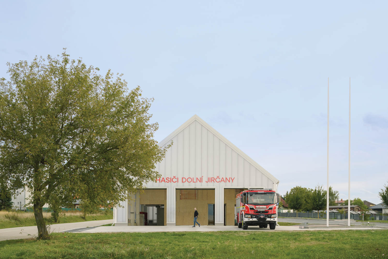 A fire truck parked in front of a building.