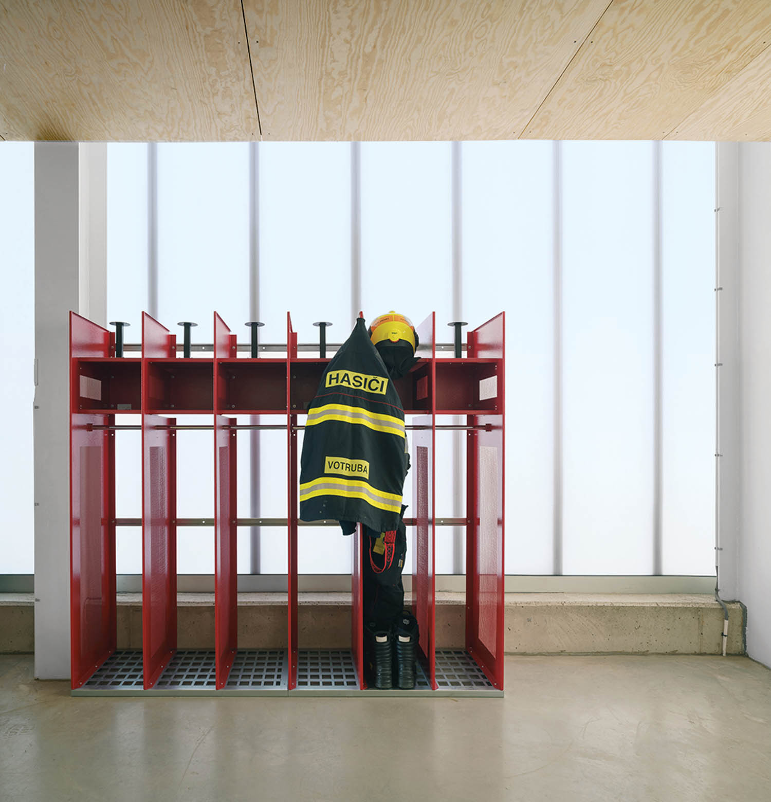 red shelf with fireman outfit