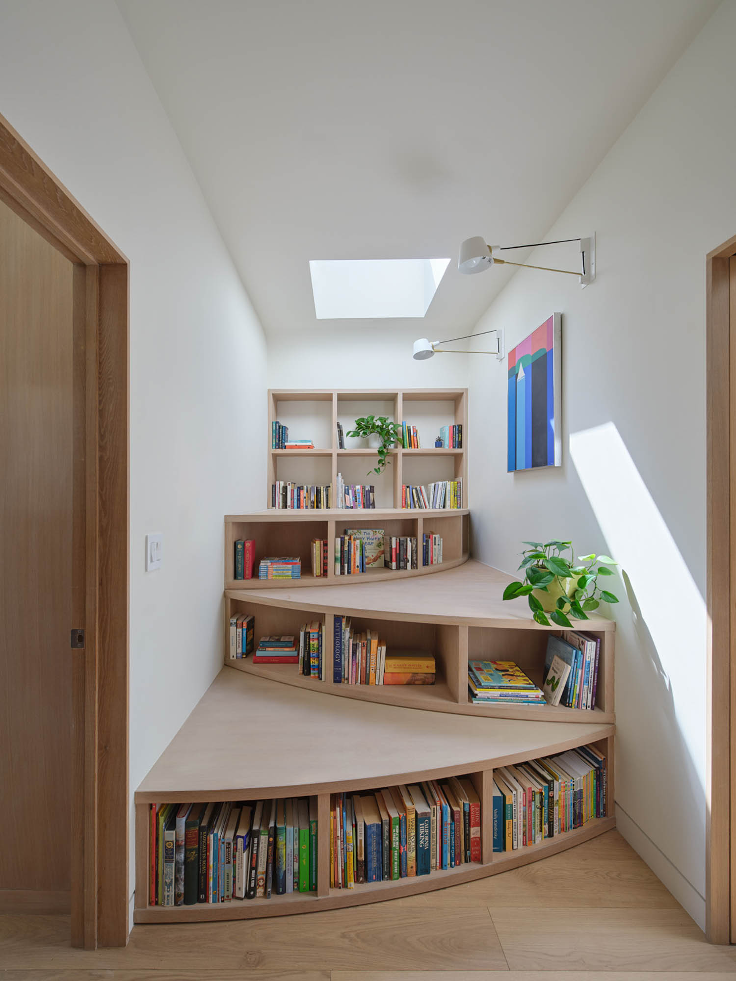reading nook with bookshelves serving as stairs