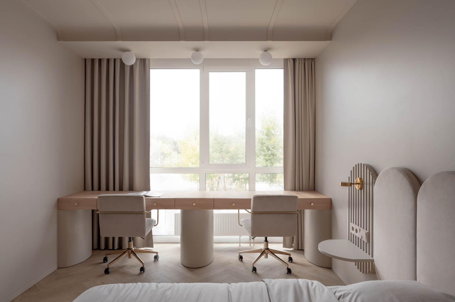 bedroom with long table and view of the outside