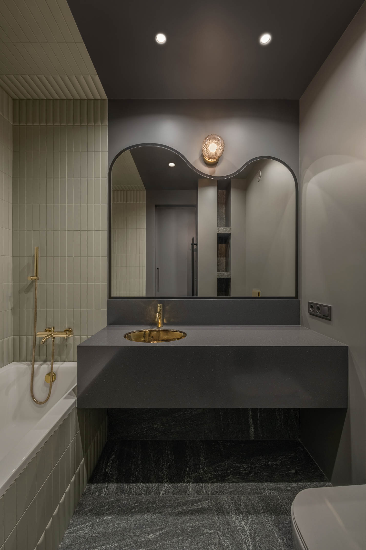 bathroom with dark paint and mirror