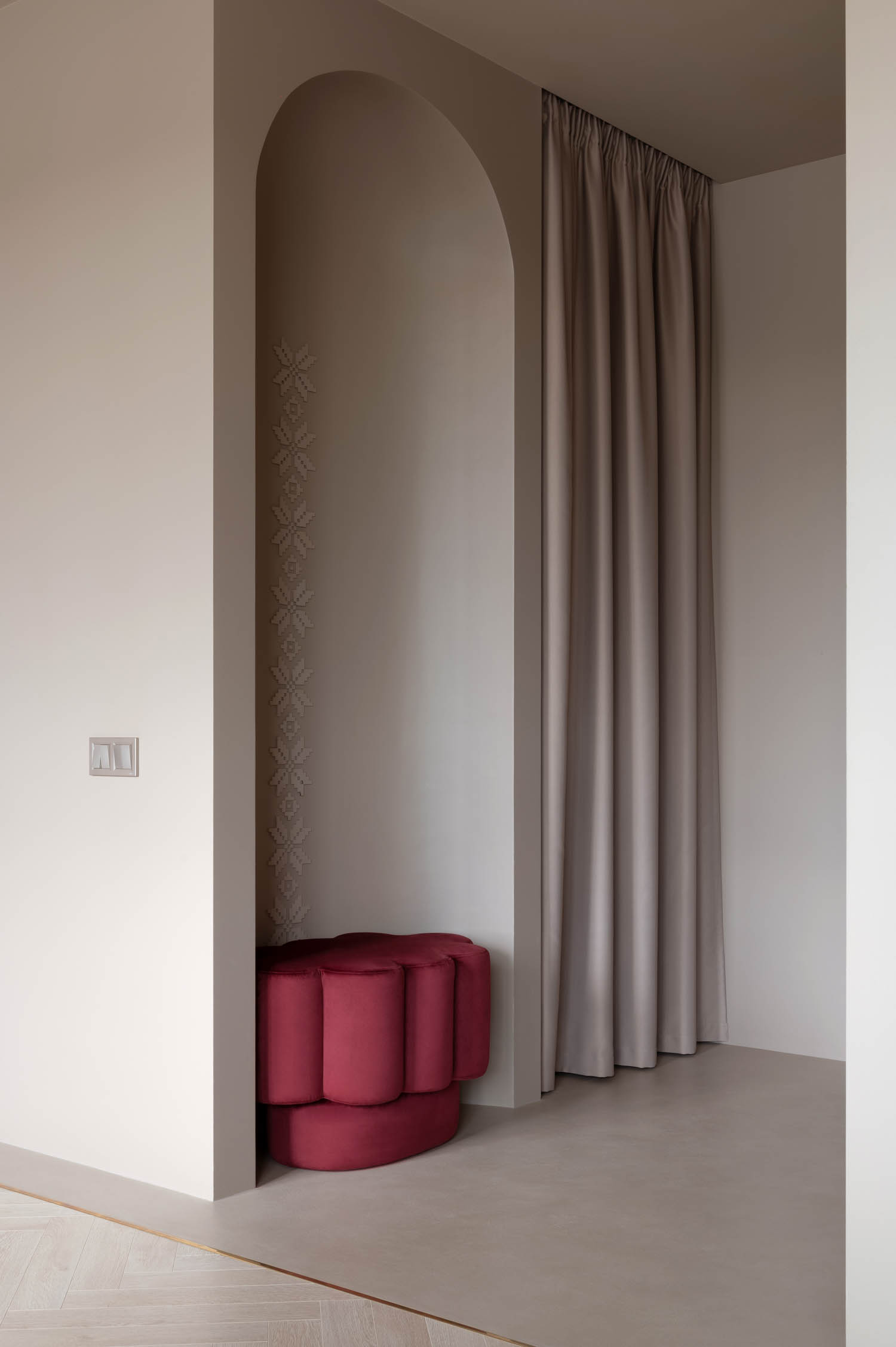 wardrobe area with maroon red stool