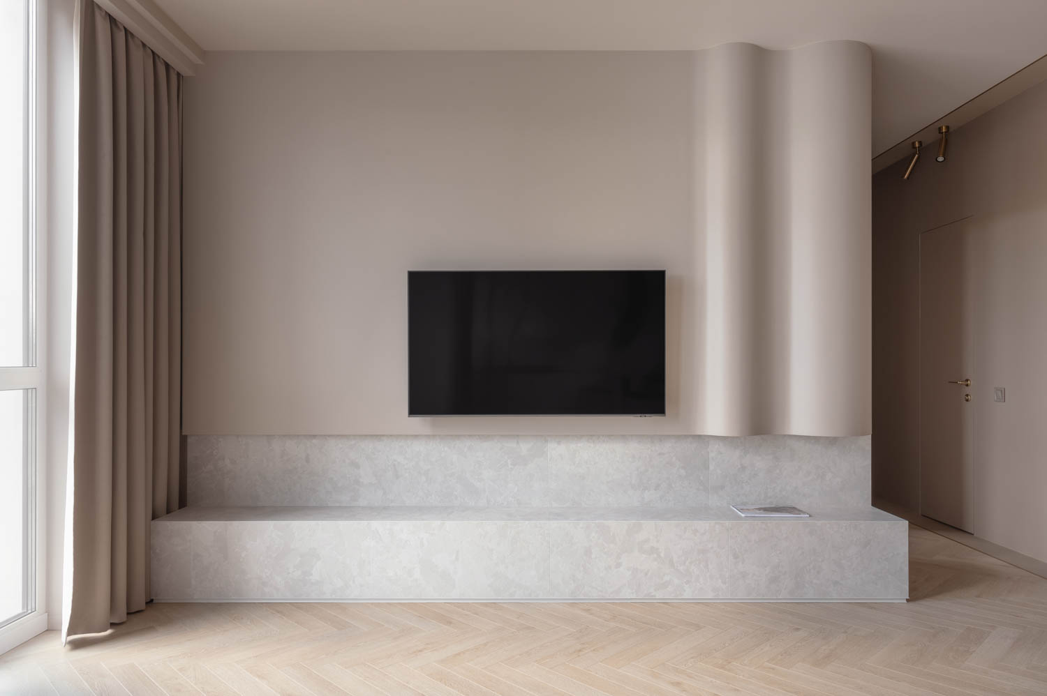 living room with tv and wavy wall