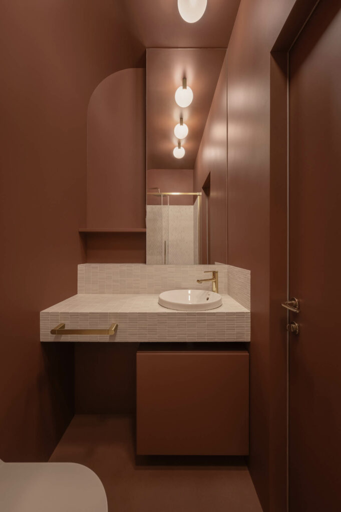 bathroom with terracotta walls