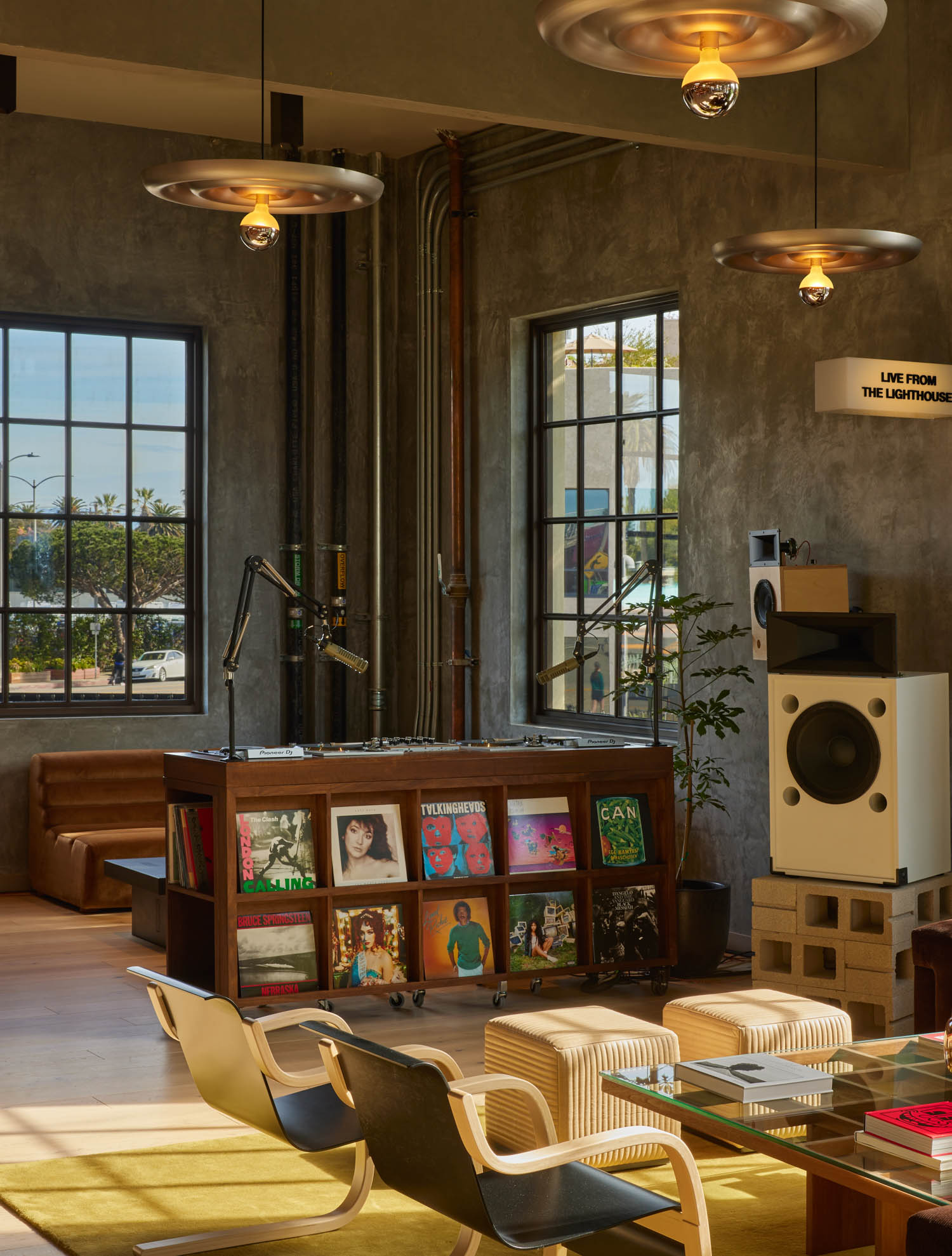 nook area with couches and shelf with records