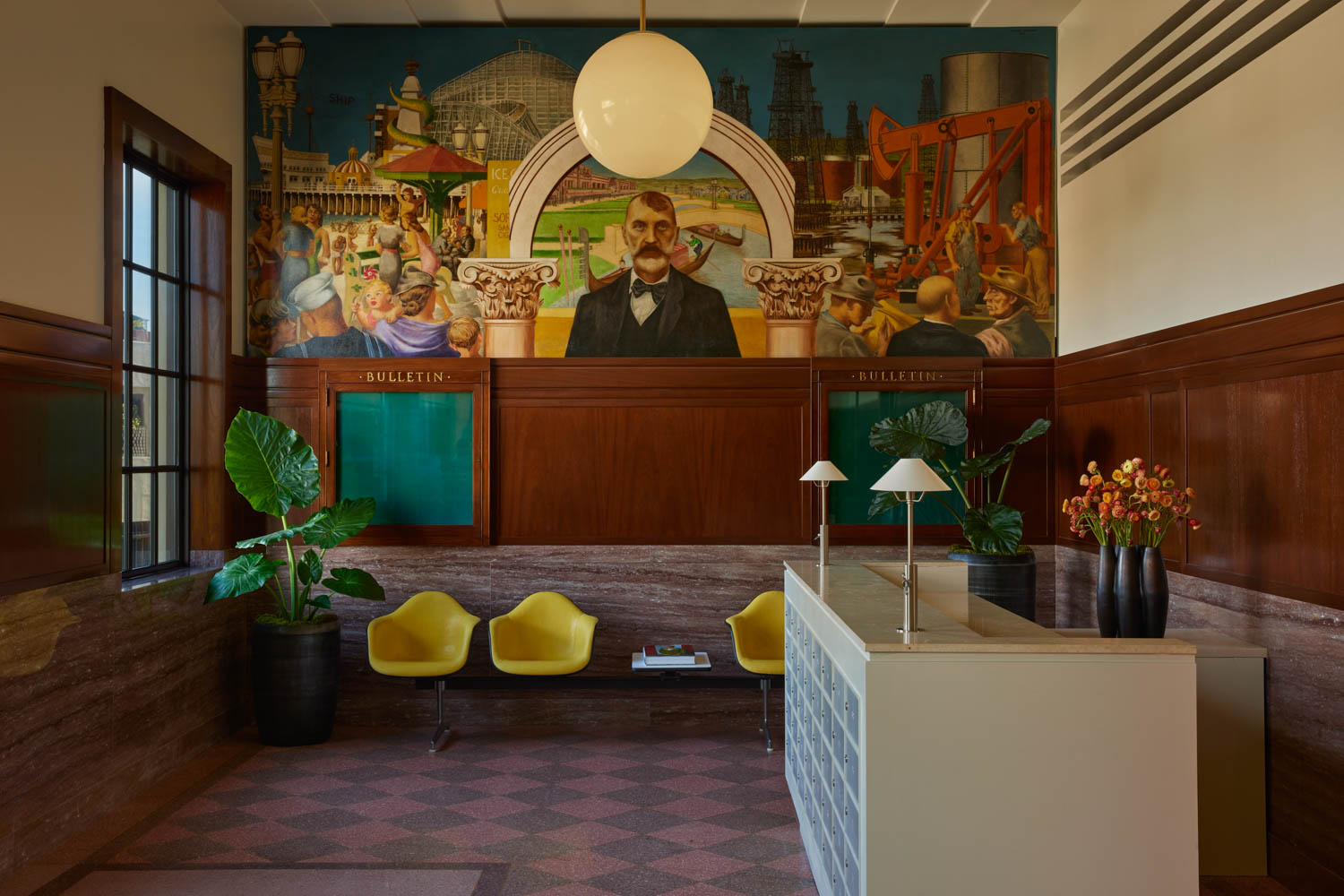 lobby area with historic painting on wall