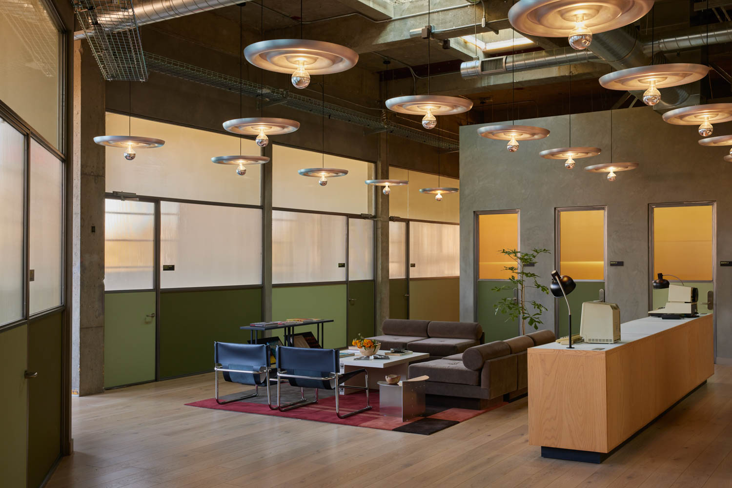 part of room with circular lights and lounge area