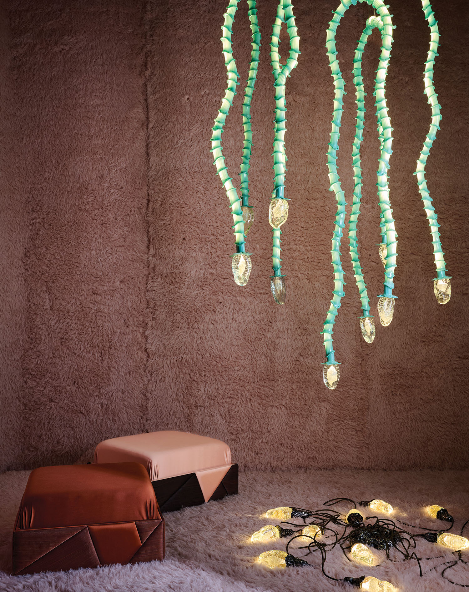 A bunch of lights hanging from a ceiling.