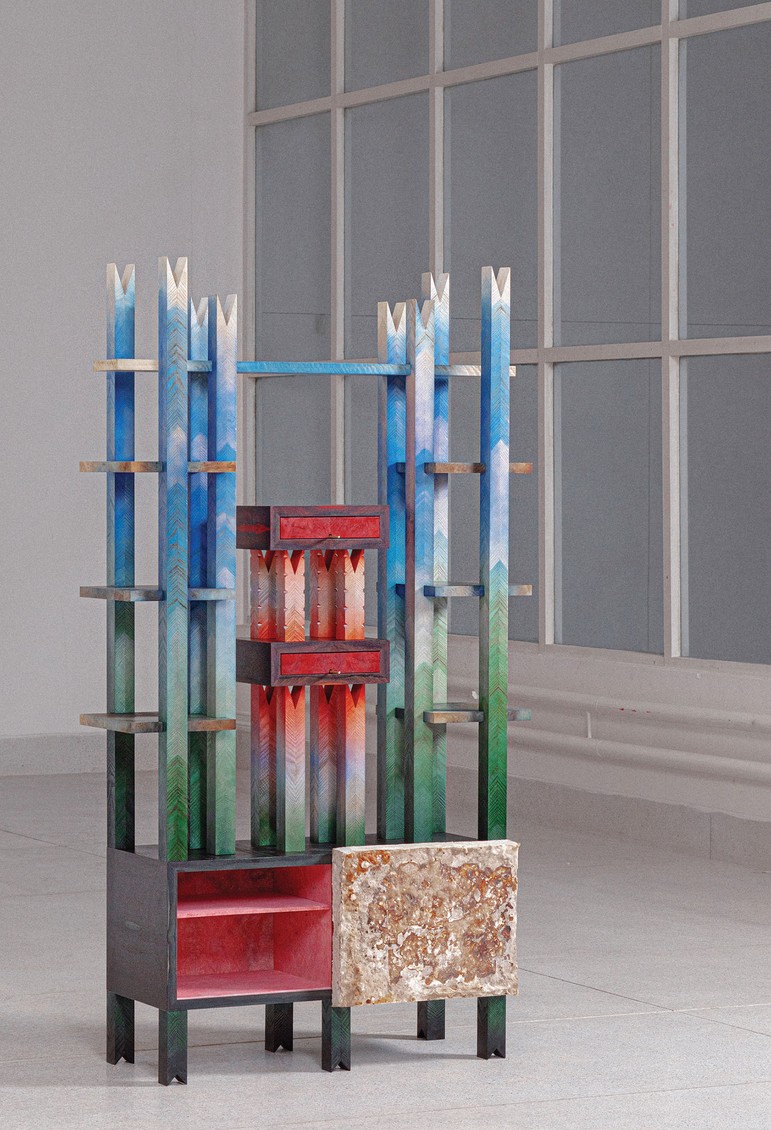 A sculpture made of wood and glass.