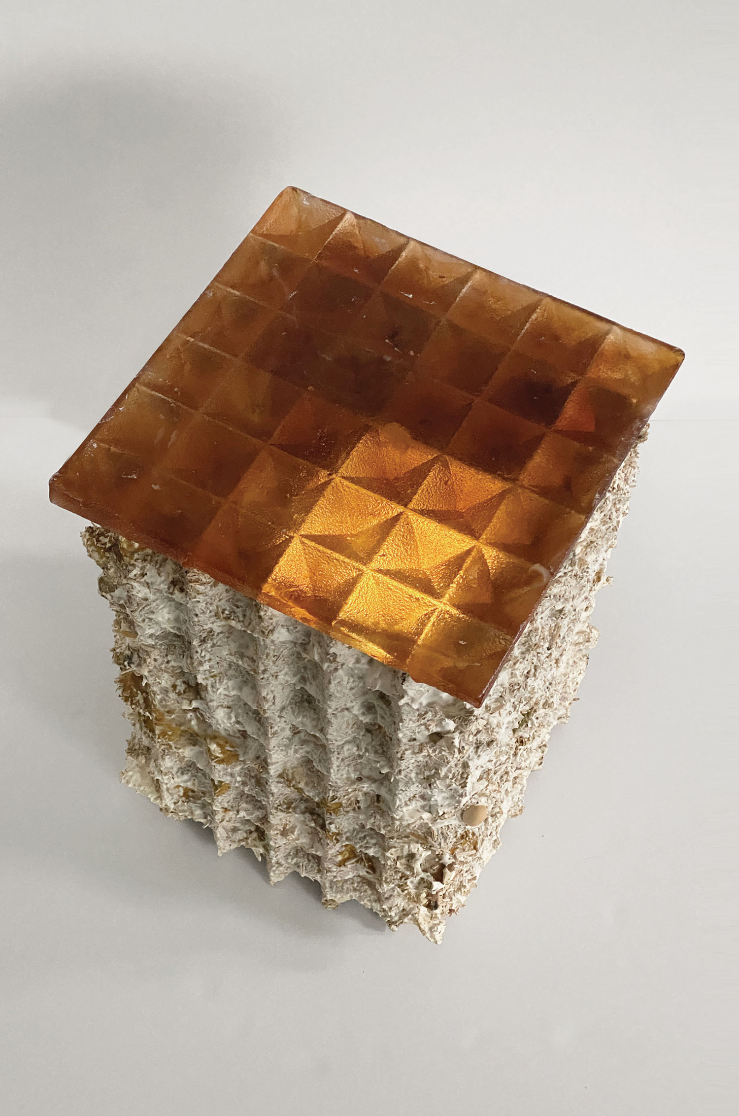A piece of art made of a piece of glass.