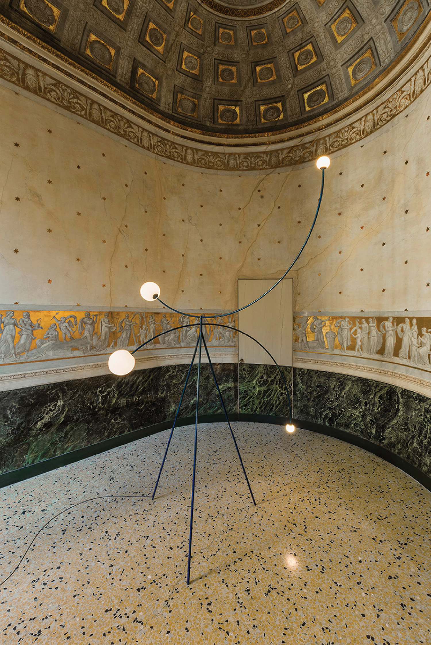 A room with a marble floor and a ceiling.