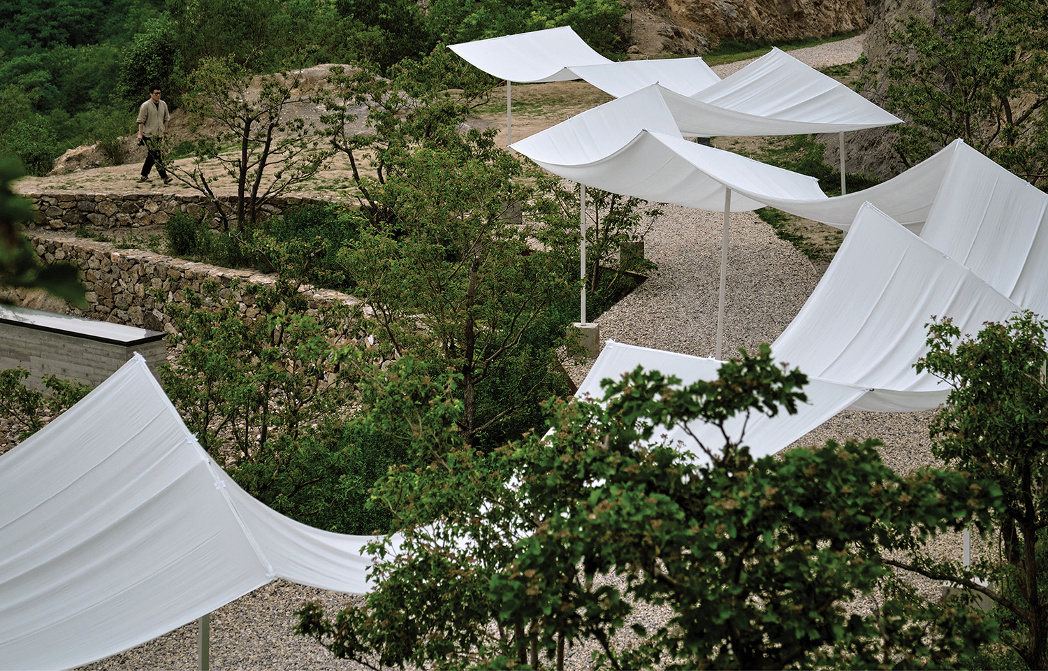 A bunch of white umbrellas.