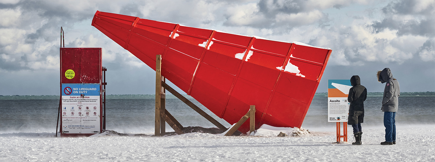A red boat on the beach.