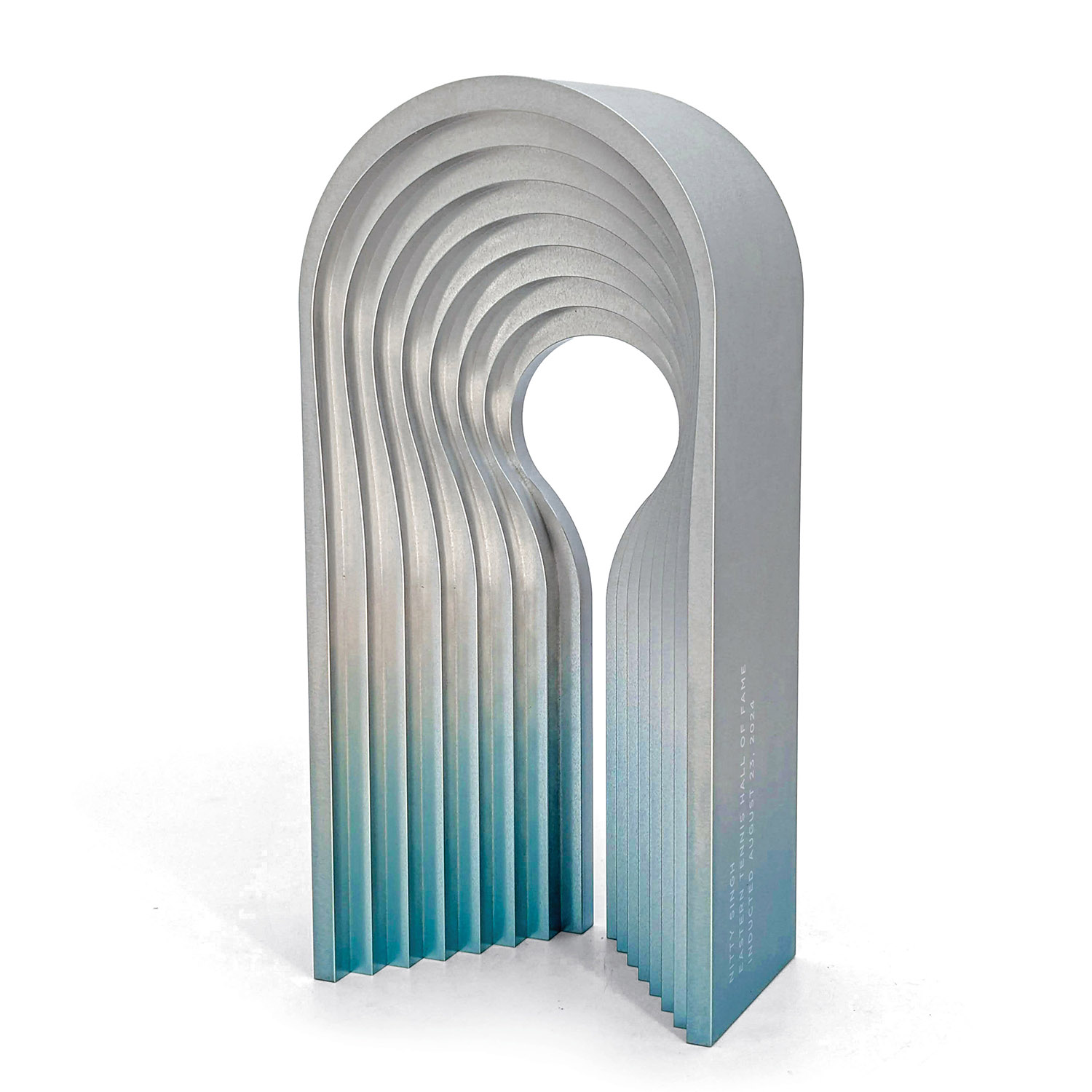 A set of six metal pieces with a white background.