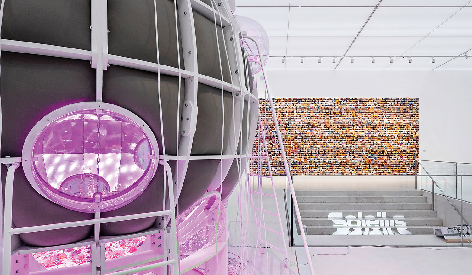 A large purple object in a white room.
