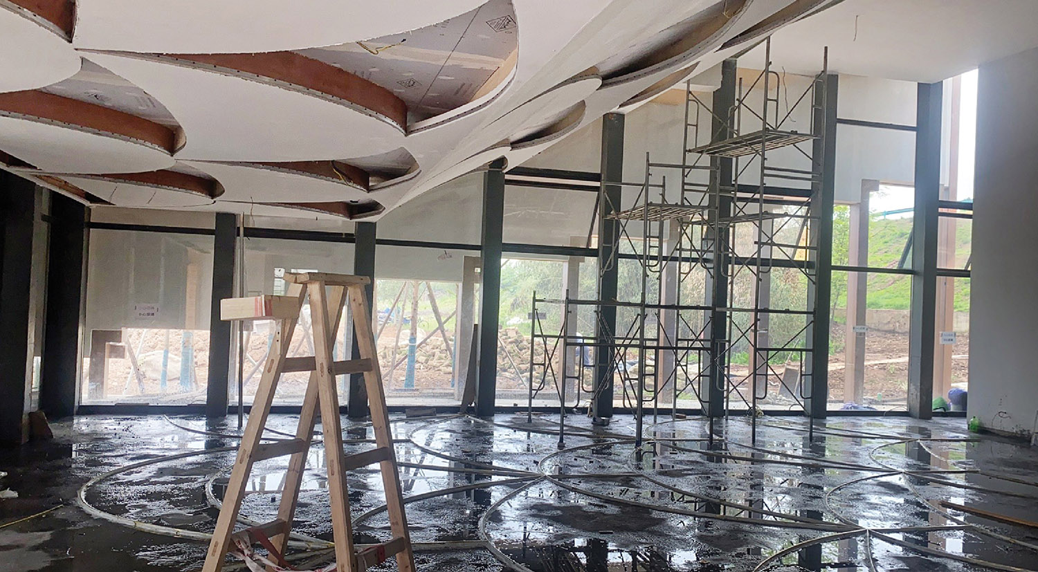 A room with a lot of debris on the floor.
