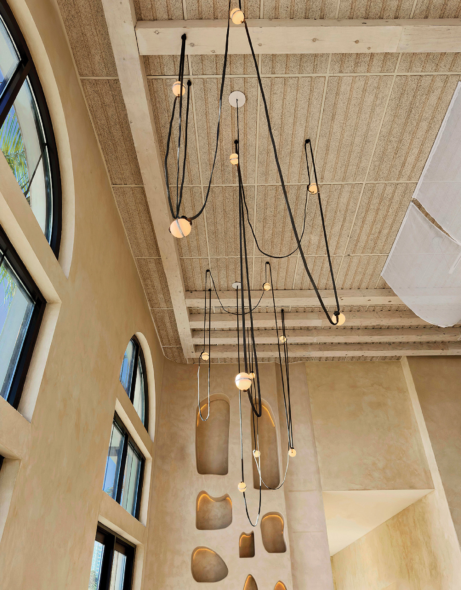 A large chandel hanging from the ceiling.
