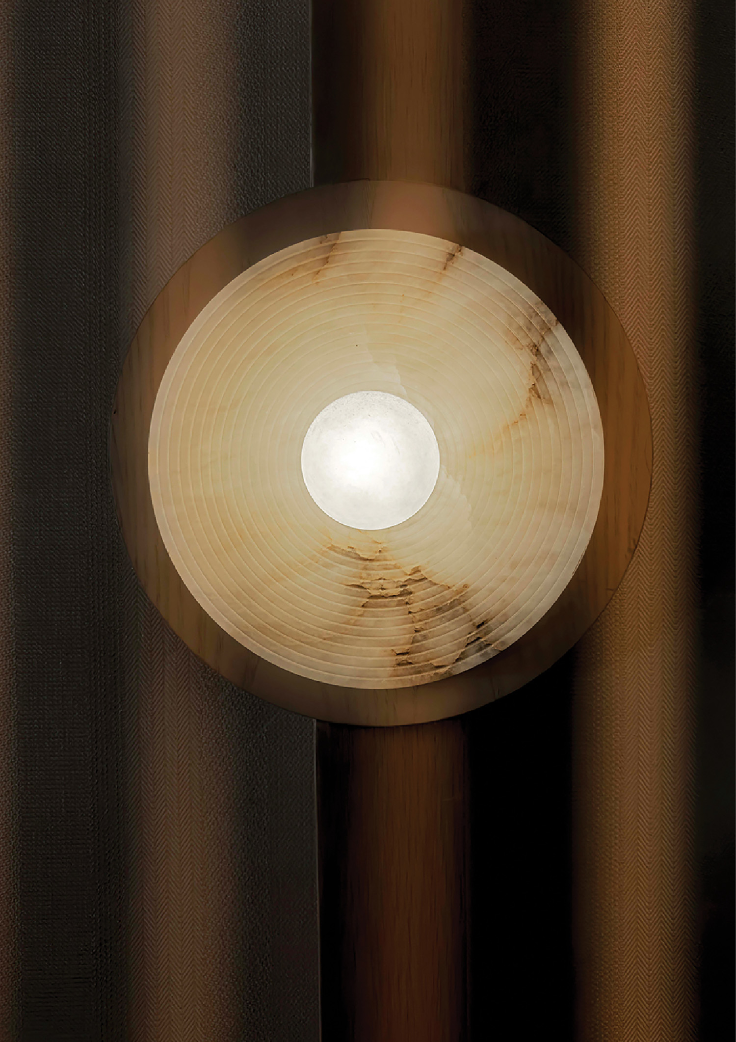 A light that is on a wooden pole.