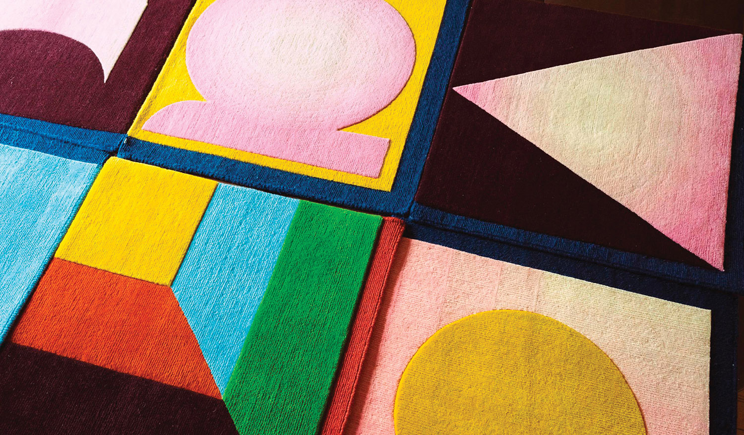 A painting of a colorful geometric pattern.