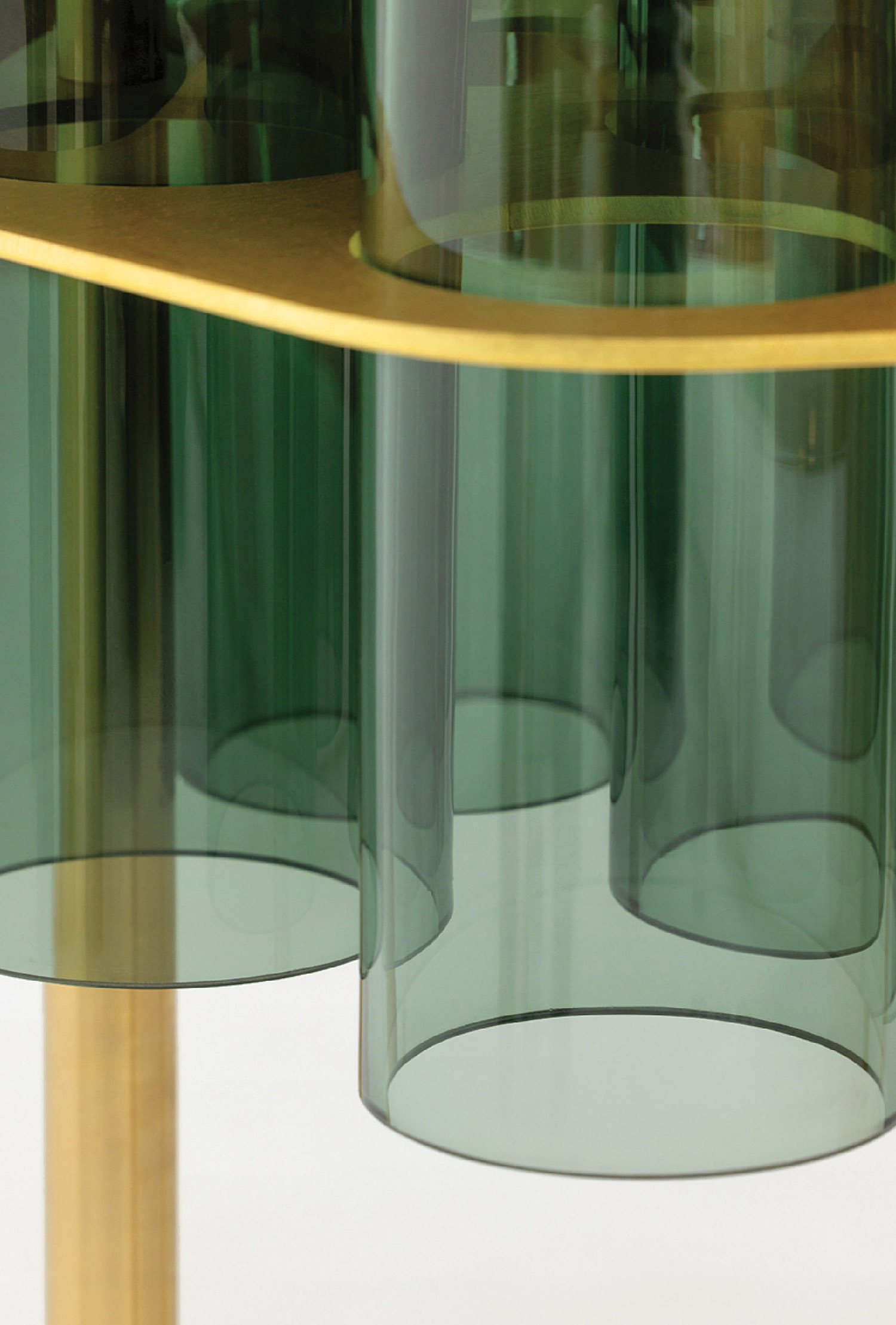 A close up of a table with a glass vase.