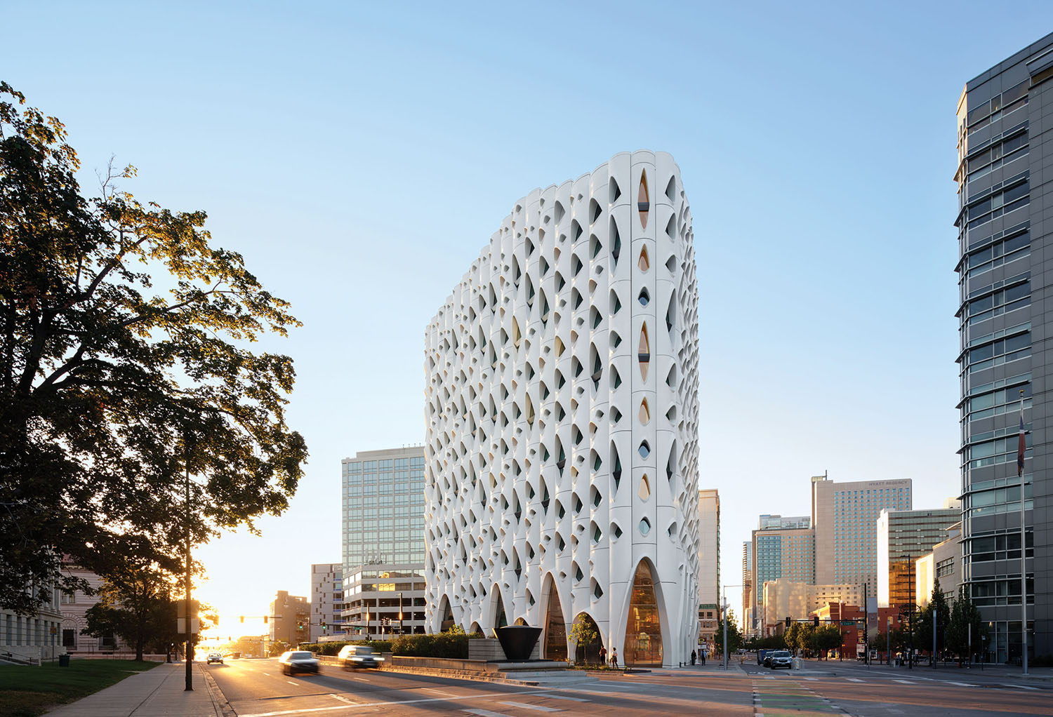 The building is made of white and green leaves.