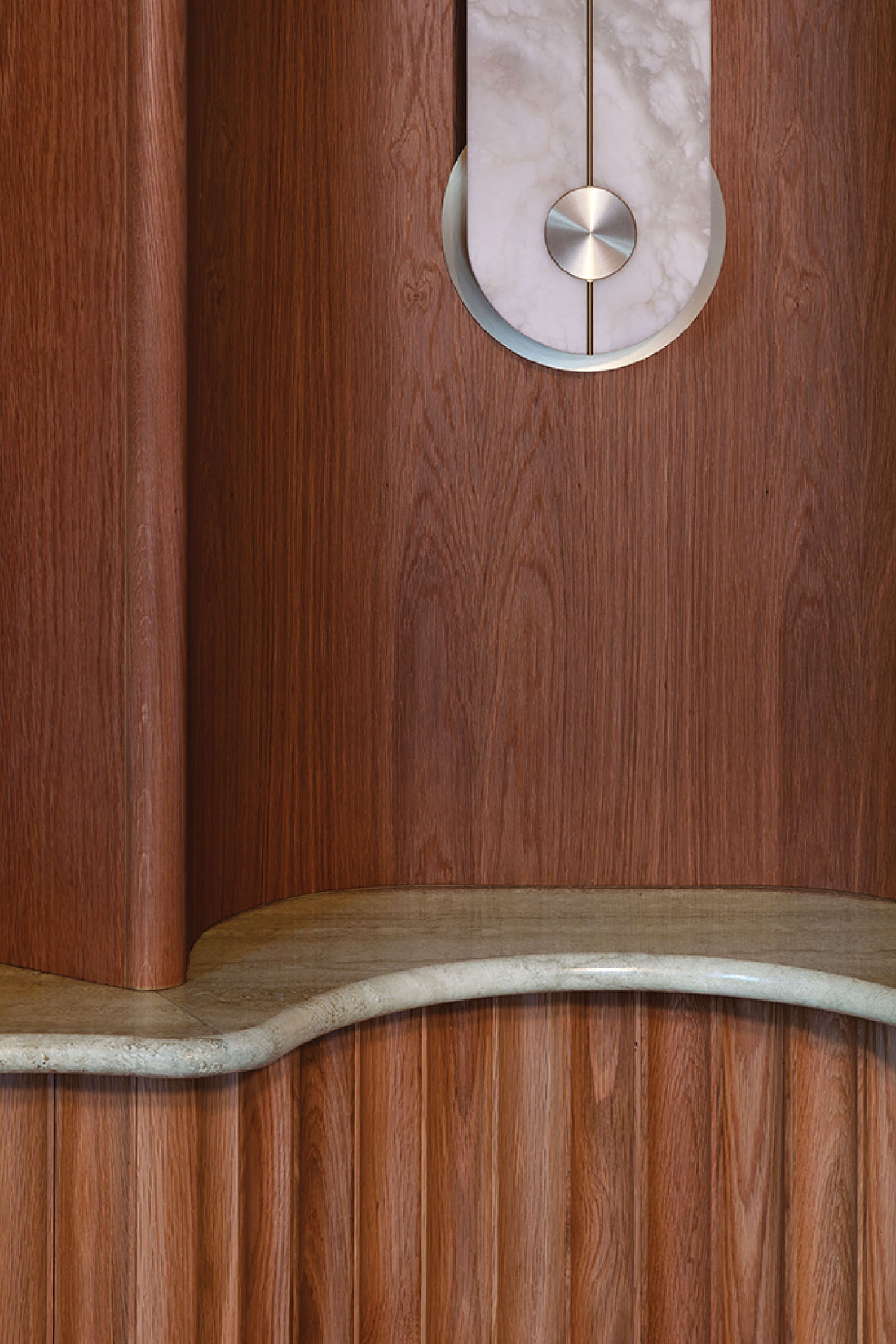 A wooden wall with a clock on it.