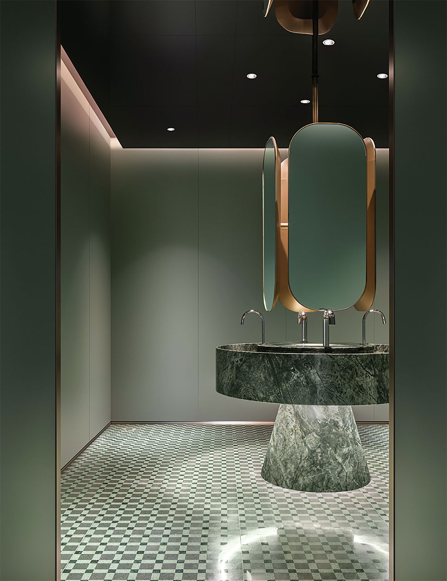 A bathroom with a marble sink and a mirror.