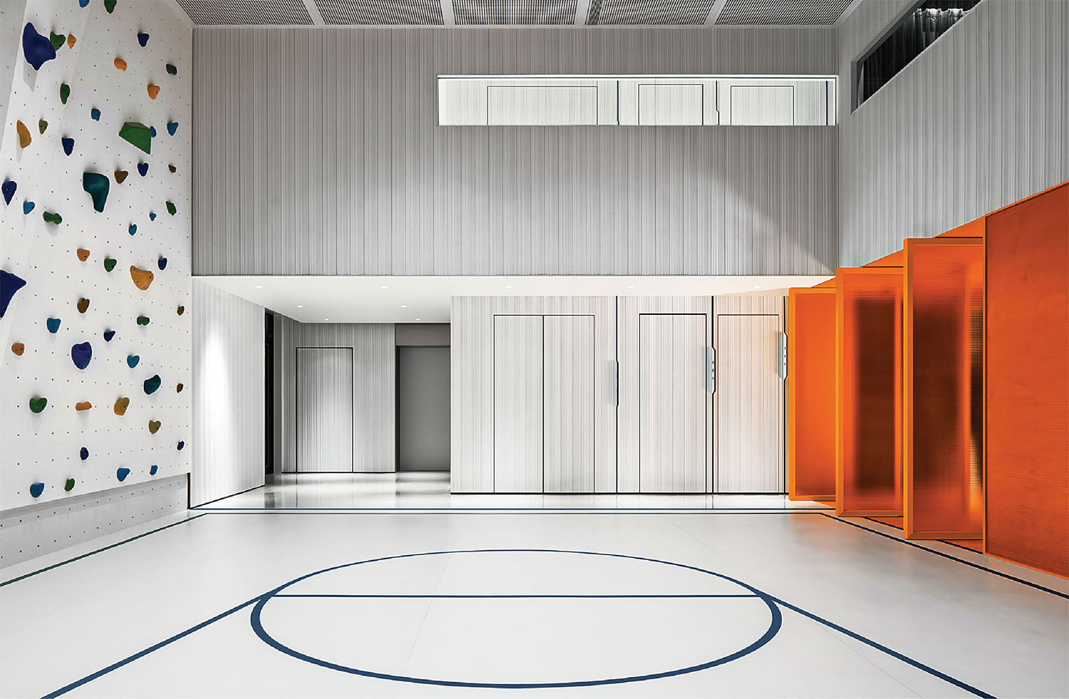 A basketball court with a basketball hoop in the middle.