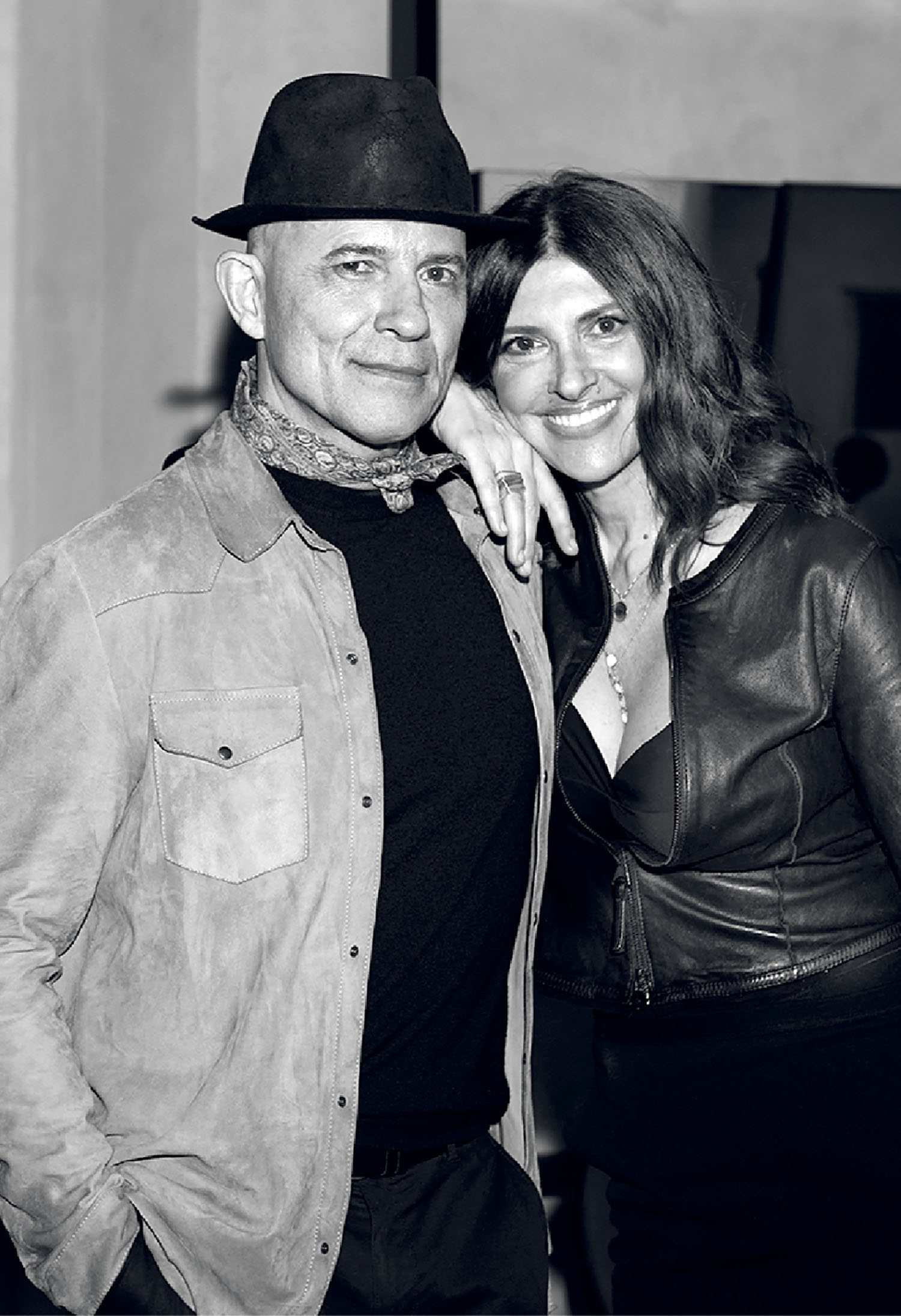 A man and woman posing for a picture.