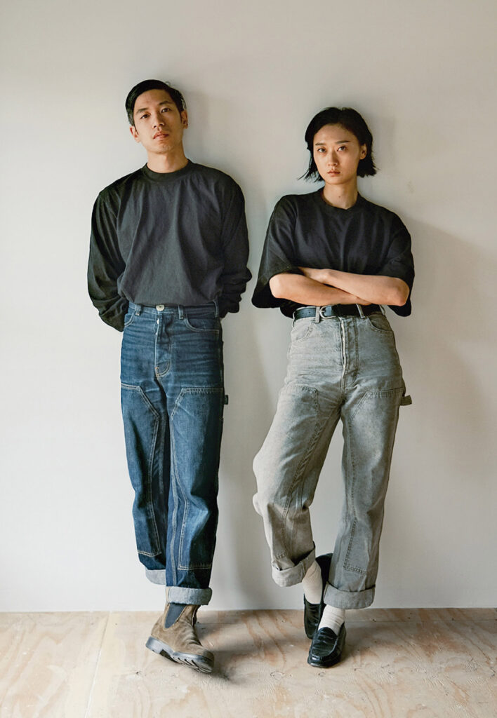 Two people standing next to each other person.