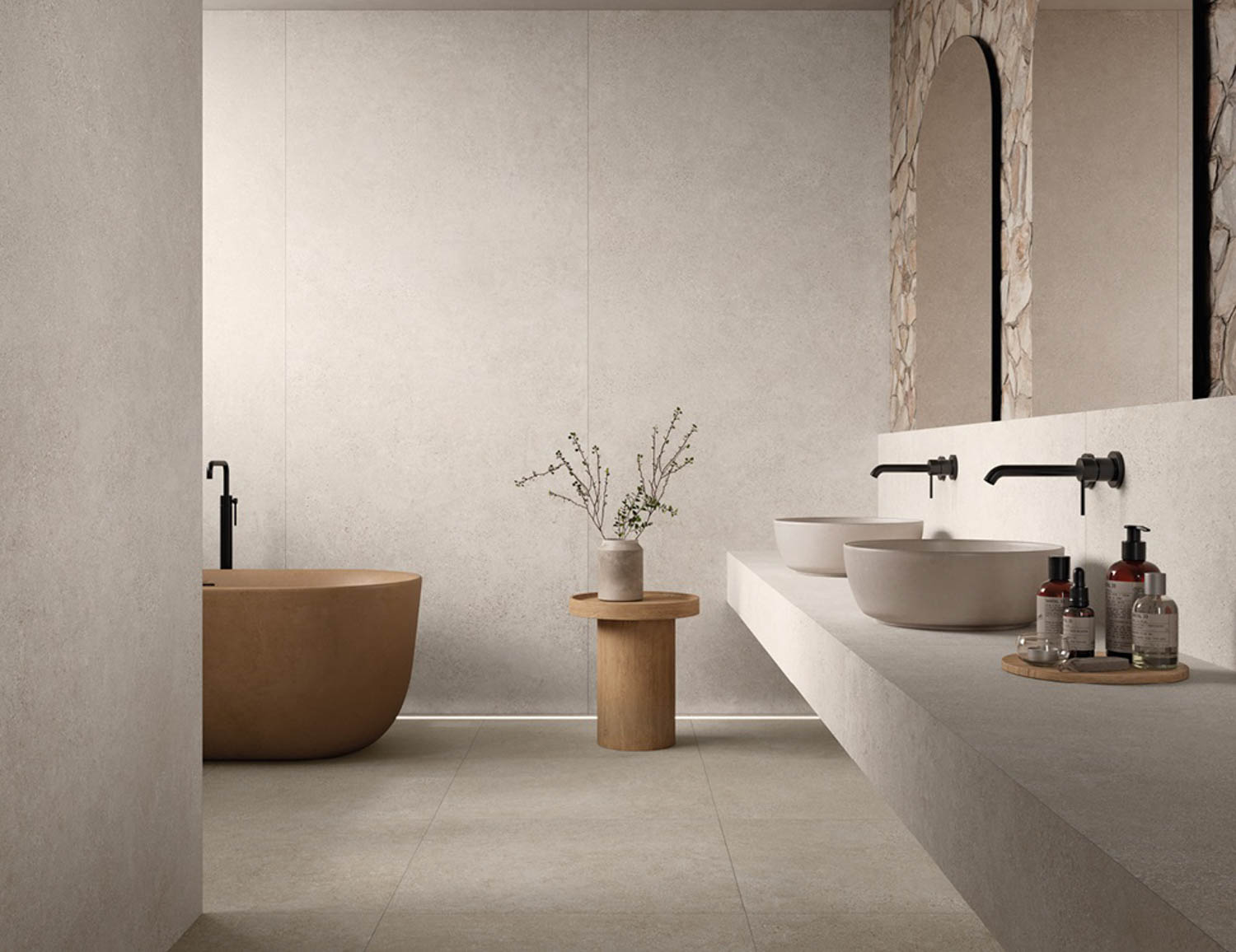a cream bathroom covered in tile