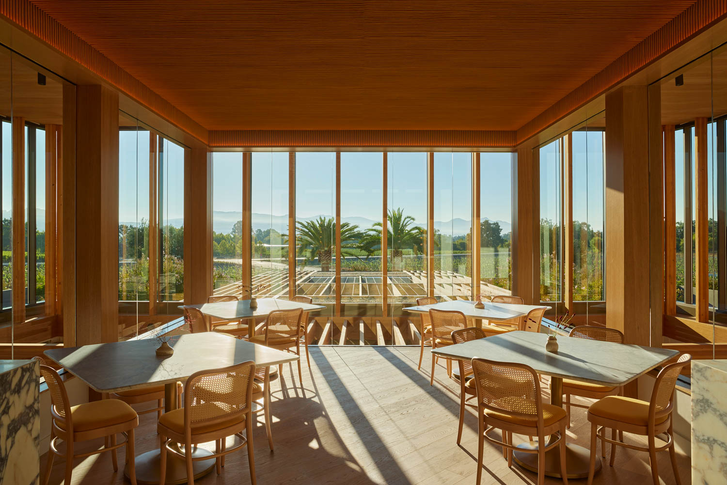 tasting room with lots of glass windows and seating