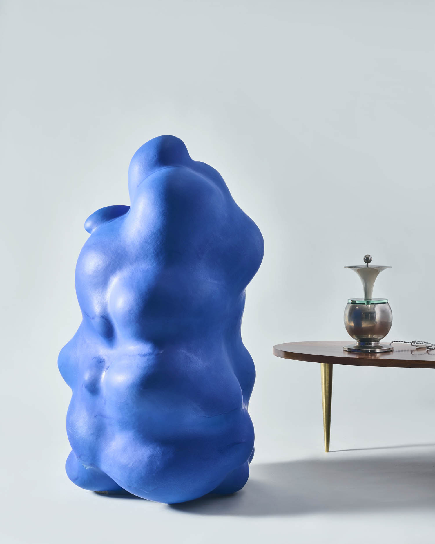 blue large scale art piece next to table