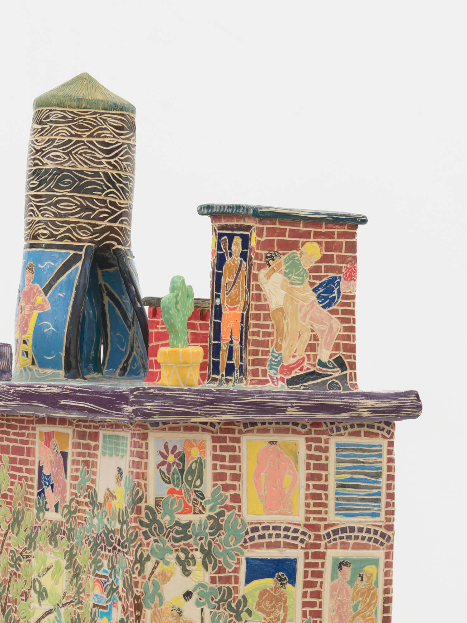 closeup of multiple people on a house in ceramic