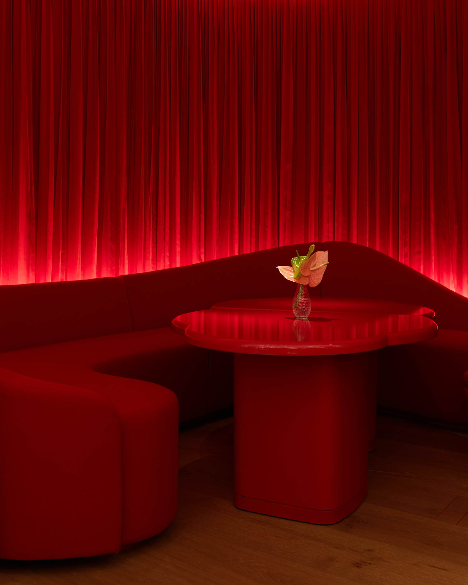 dark red room with drapes