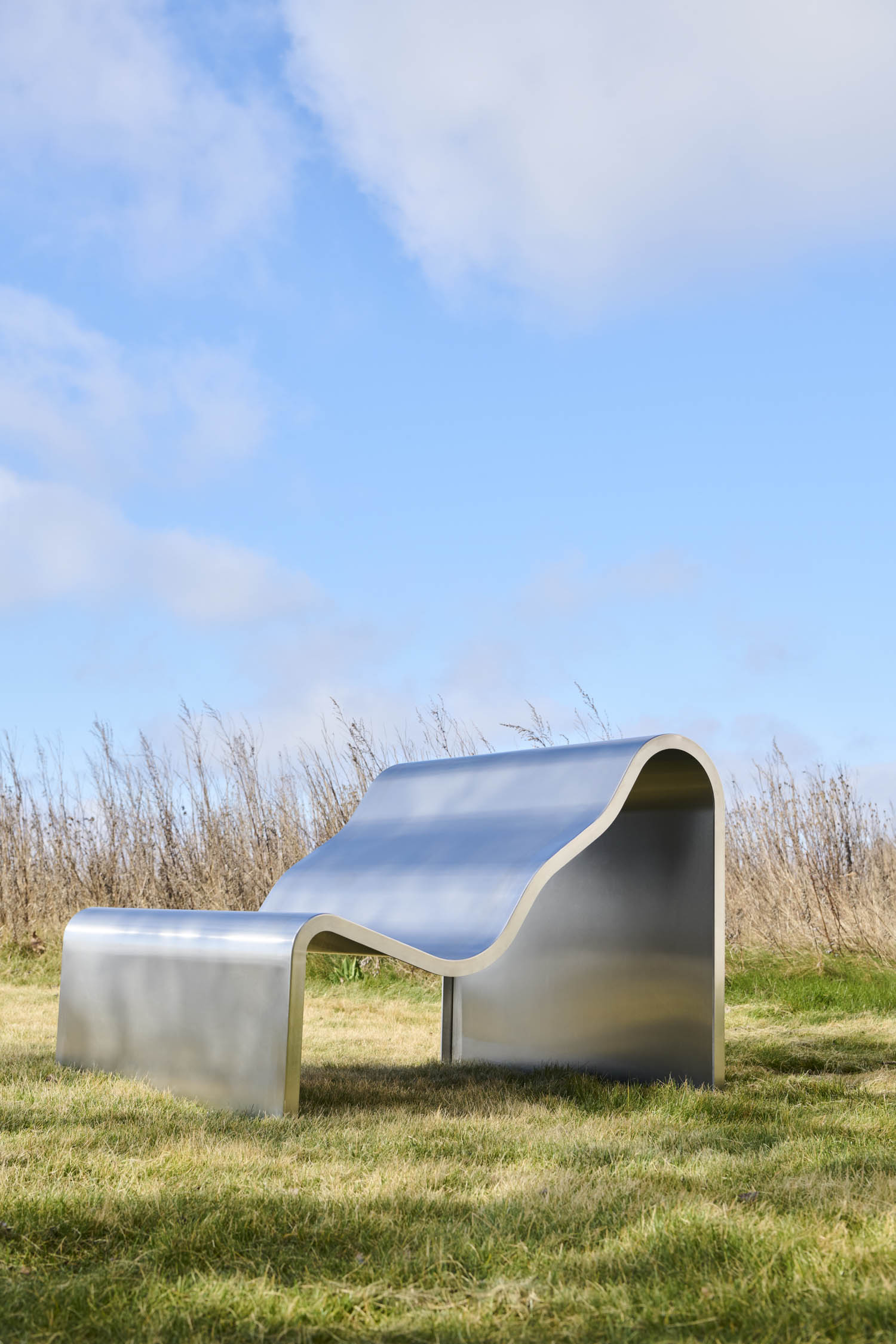 metal bench in a field