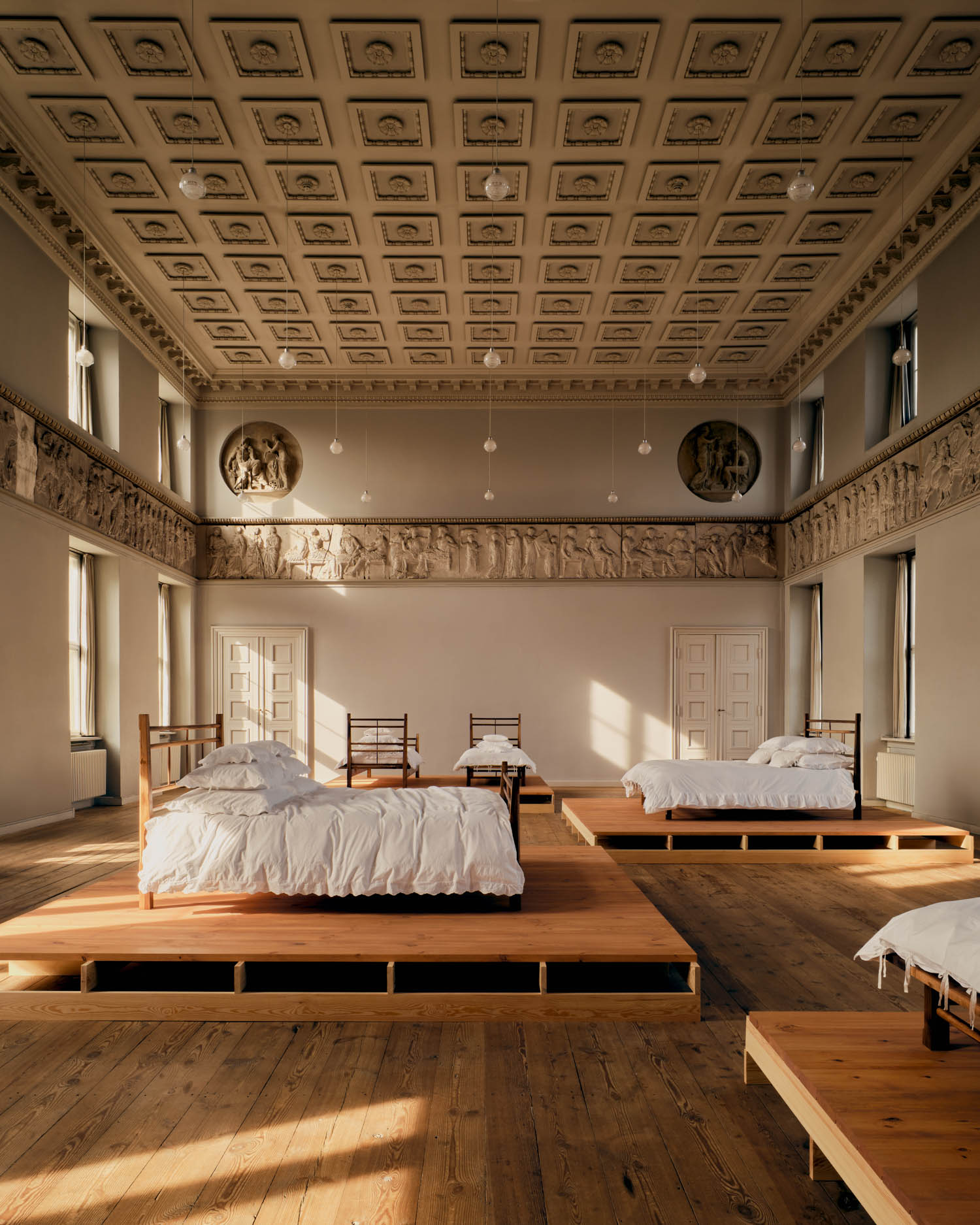 room with multiple beds
