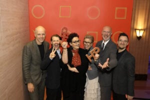 Cindy Allen and other people posing for the HiP Awards